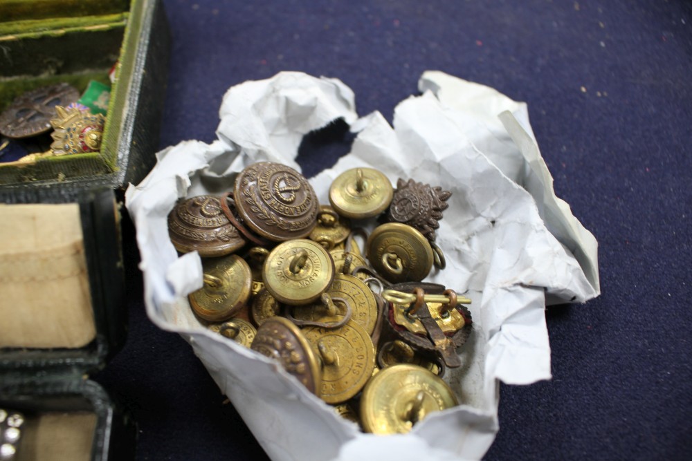 A WWI group of two medals to 35247 Private C E Jolleys Royal Lancs Regiments, a group of assorted badges, three paste set buckles and s